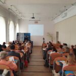 Goście konferencji na sali wykładowej